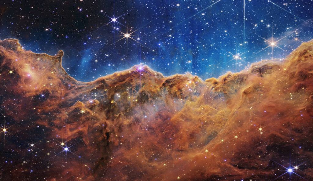 JWST captured this stunning image of a portion of the Carina Nebula dubbed the 'Cosmic Cliffs' in July, 2022. Image Credit: NASA, ESA, CSA, and STScI