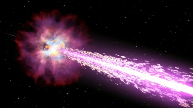 An artist impression of a gamma-ray-burst seen as a bright purple flash in the foreground, outside the bright area in the background.